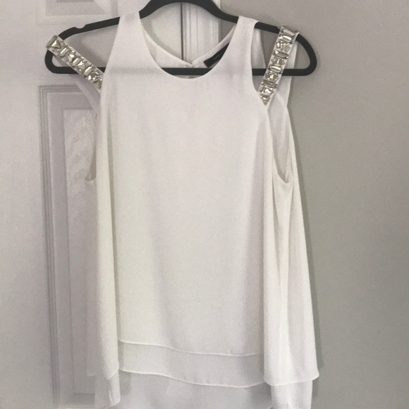 BCBGMaxAzria Tops - White silk top wgem embellished shoulder design